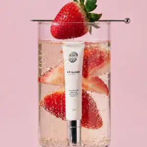 UNICO LIP GLOSS FLIRT / Блиск для губ з ароматом стиглої полуниці та шампанського